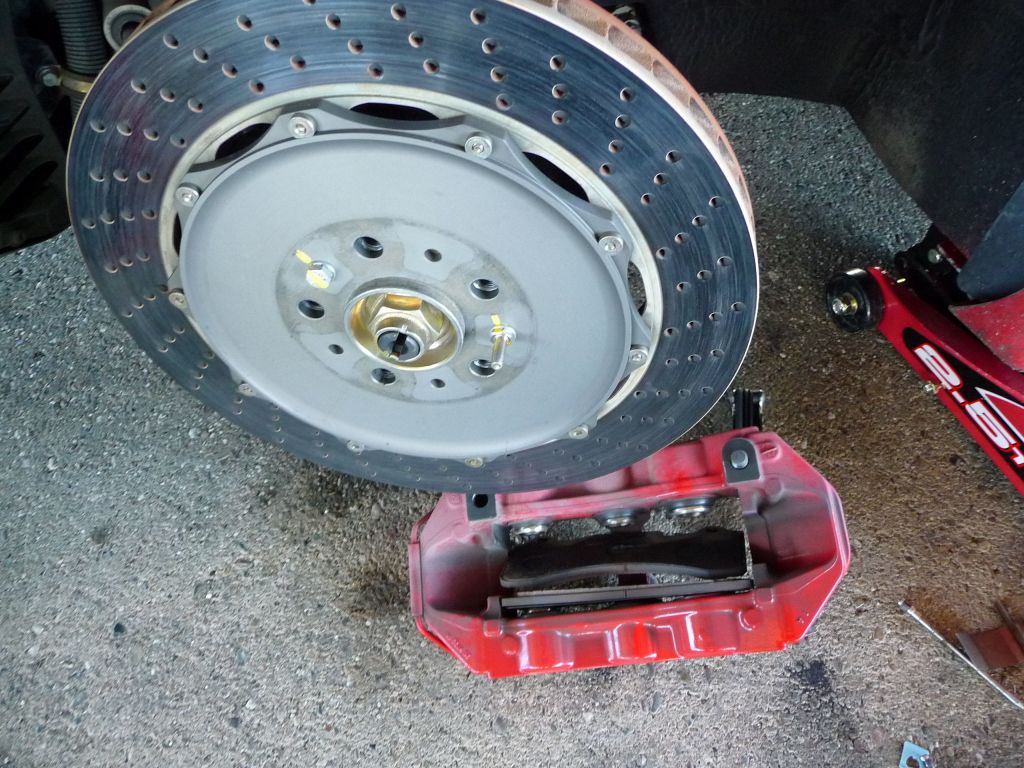 The big bolts had to be taken out and the caliper split in two