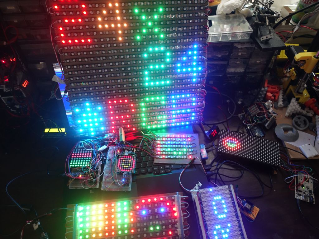 All the displays, 4 made with neopixels and soldered by hand