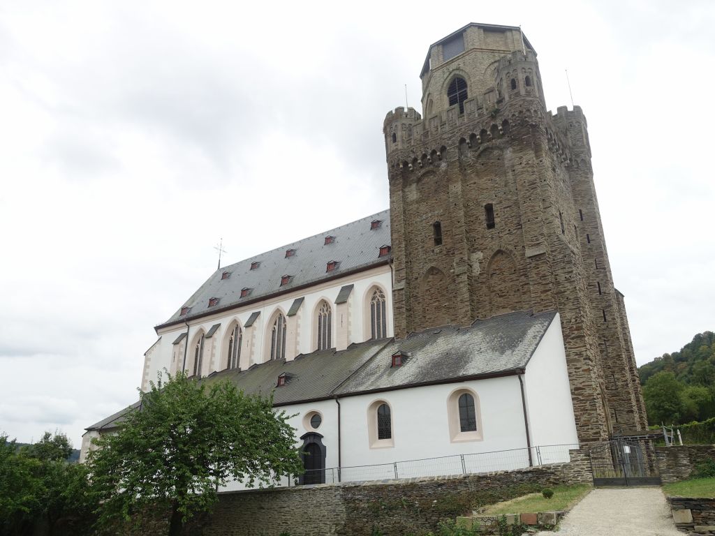 after this city wall tower went unused, that church stole in and grafted itself onto it :)