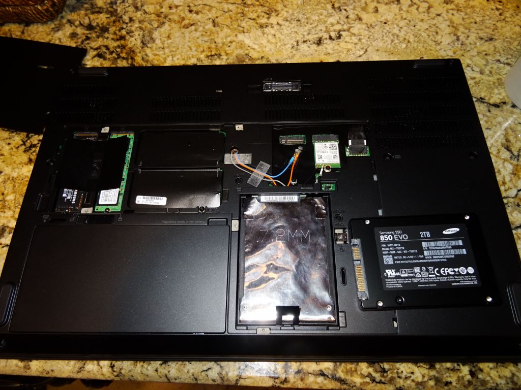 the 2 M2 slots are on the right, and the 2nd drive goes under where the SSD is visible in this picture