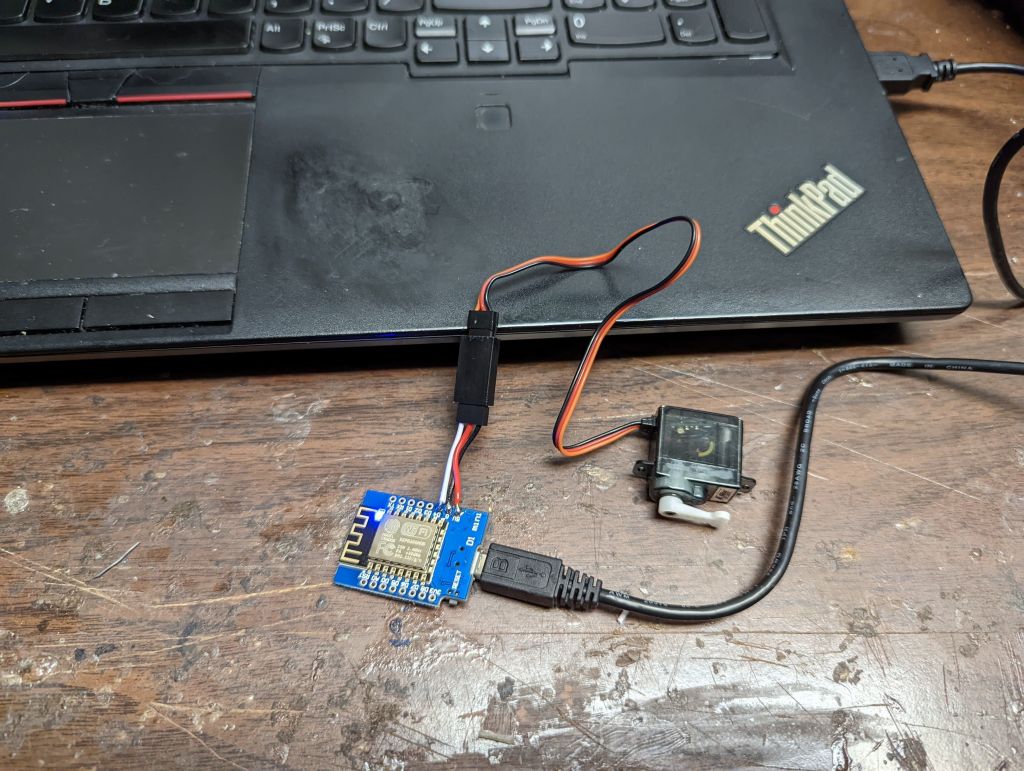 once I got the servo validated, I connected it to an ESP8266 as a wifi controller