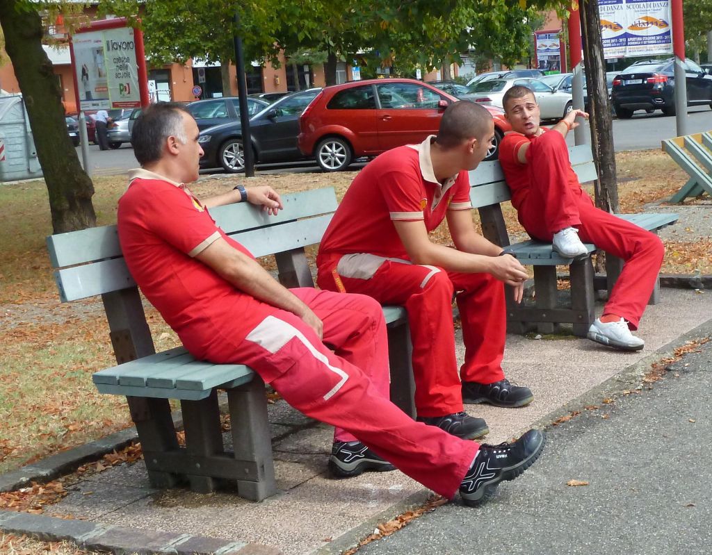 All the ferrari staff wears work uniforms, red for builders and white for engineers