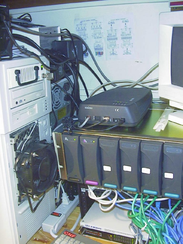 Two servers, one file/master server (also home automation) and one router server, with UPS on top