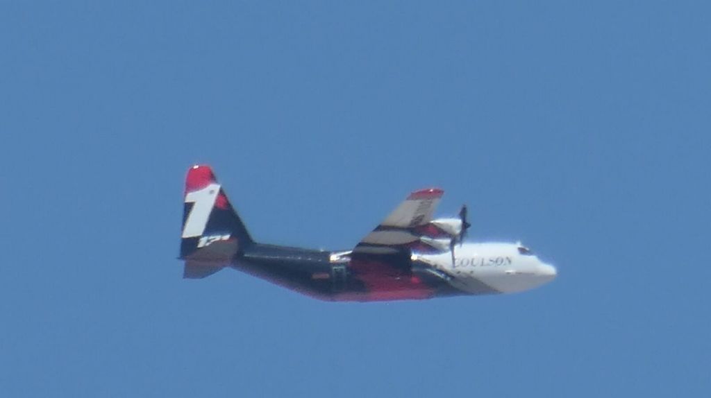 multiple fires, one of the planes fighting the fires