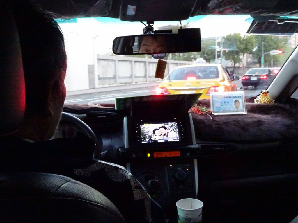 driving a cab is less boring if you can watch TV at the same time
