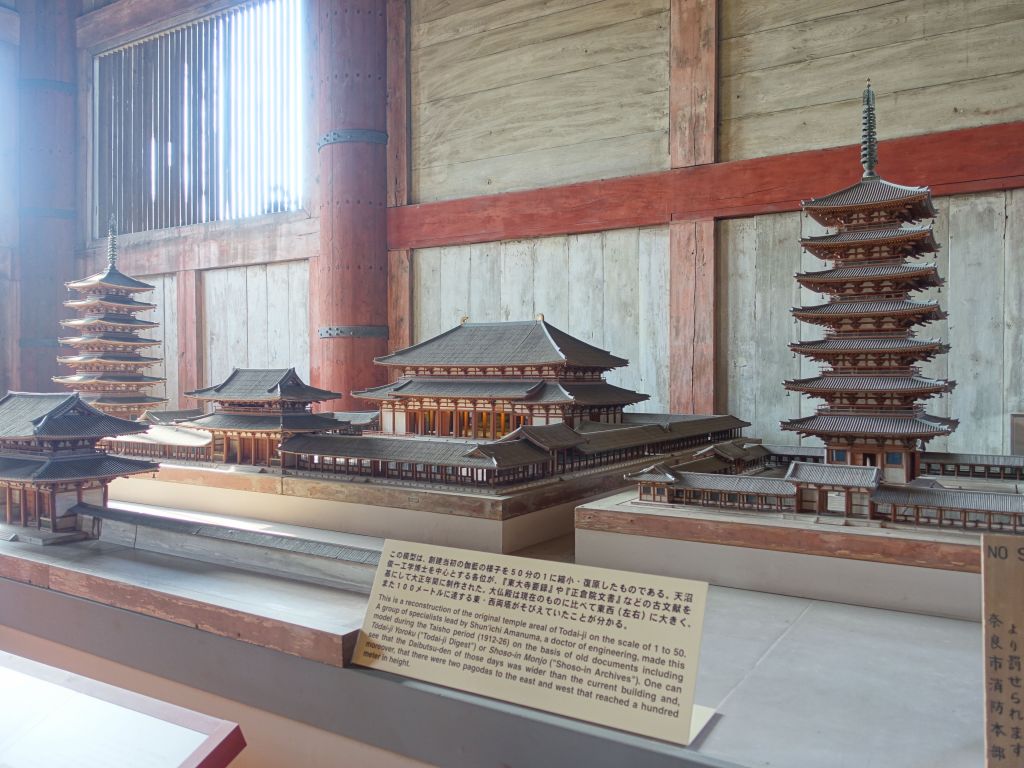 what the old temple looked like before it burned down, with 2 huge pagodas on its side